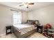 Comfortable bedroom featuring a natural light, a bed, and decorative elements at 9740 Logan Ln, Fishers, IN 46037
