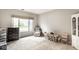 Versatile bonus room with ample natural light, neutral tones, and comfortable seating at 9740 Logan Ln, Fishers, IN 46037