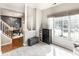 Inviting entryway with a staircase, large window, and stylish furniture at 9740 Logan Ln, Fishers, IN 46037