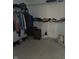 Walk-in closet with shelves and hanging racks full of clothing and accessories at 10523 Dark Star Dr, Indianapolis, IN 46234