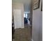 Spacious foyer with tile flooring that opens to the living area, bathed in natural light at 10523 Dark Star Dr, Indianapolis, IN 46234