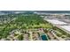 Aerial shot of a residential neighborhood with tree-lined streets and lush green spaces at 10938 E Mount Vernon N Trl, Indianapolis, IN 46229
