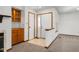 Inviting entryway featuring a tile floor, white trim, and convenient storage cabinets at 10938 E Mount Vernon N Trl, Indianapolis, IN 46229