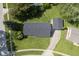 Aerial perspective of a home with a spacious yard, an attached garage, and a long driveway at 11 Sayre Dr, Greenwood, IN 46143