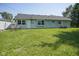 Lush backyard featuring green grass and plenty of space for outdoor enjoyment and relaxation at 11 Sayre Dr, Greenwood, IN 46143