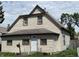 Charming two-story home with vinyl siding, a newer roof, and a 'For Sale' sign in the window at 1163 Groff Ave, Indianapolis, IN 46222