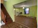Large living room with hardwood floors and view into kitchen at 1163 Groff Ave, Indianapolis, IN 46222