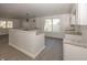 Modern kitchen features an open layout with granite countertops at 12003 Broadway St, Indianapolis, IN 46236