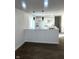 Bright, updated kitchen featuring white cabinets, granite countertops, and modern pendant lighting at 12003 Broadway St, Indianapolis, IN 46236