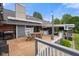 Deck area with comfortable seating, grill, and string lights at 12196 N Beth Ann Dr, Camby, IN 46113