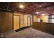 Unique basement with wood walls and a decorative ceiling at 12196 N Beth Ann Dr, Camby, IN 46113