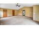 Bright living room features neutral paint and carpet, vaulted ceiling and views to multiple rooms at 12196 N Beth Ann Dr, Camby, IN 46113