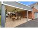 Outdoor patio with dining furniture, brick accents, and overhead heaters at 12196 N Beth Ann Dr, Camby, IN 46113