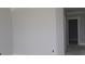 This is a room with light gray walls, white trim and bare concrete floors at 12524 Morning Ridge Way, Noblesville, IN 46060