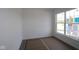 Unfinished room with a large window showing construction progress at 12532 Morning Ridge Way, Noblesville, IN 46060
