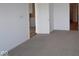 An open bedroom features new carpeting and fresh, painted walls at 12532 Morning Ridge Way, Noblesville, IN 46060