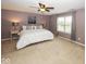 Calm Primary bedroom with carpet, ceiling fan and lots of natural light at 12845 Touchdown Dr, Fishers, IN 46037
