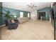 Bright living area with comfortable seating and view into additional rooms at 12845 Touchdown Dr, Fishers, IN 46037