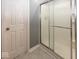 Glass-enclosed shower stall, tiled flooring and baseboards in a bathroom at 12845 Touchdown Dr, Fishers, IN 46037