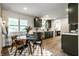 A lovely dining area with a cozy setup and ample natural light at 130 N High School Rd, Indianapolis, IN 46214