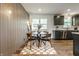 The dining area features modern lighting and an open layout at 130 N High School Rd, Indianapolis, IN 46214