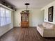 Comfortable living area with a vintage hutch and couch, providing a cozy space for relaxation at 1442 Bank Pl, Indianapolis, IN 46231
