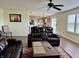 Comfortable living room featuring modern furniture and an open layout connecting to the kitchen at 1442 Bank Pl, Indianapolis, IN 46231
