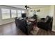 Spacious living room with large windows and stylish furniture, creating a welcoming atmosphere at 1442 Bank Pl, Indianapolis, IN 46231