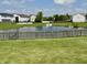 Picturesque pond with surrounding greenery, enhancing the natural beauty of the community at 1442 Bank Pl, Indianapolis, IN 46231