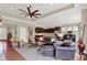 Open-concept living room, kitchen area, and hardwood floors; great for entertaining and modern living at 1457 Birdsong Dr, Westfield, IN 46074