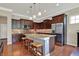 Modern kitchen featuring granite countertops, stainless steel appliances, and ample cabinet space at 1457 Birdsong Dr, Westfield, IN 46074