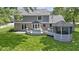 Aerial view of the backyard featuring the deck, gazebo, and expansive lawn at 15120 Romalong Ln, Carmel, IN 46032