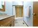 Well-lit bathroom with granite countertops, vanity, a shower-tub combo with tile surround, and modern fixtures at 15120 Romalong Ln, Carmel, IN 46032