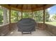 View of an outdoor gazebo including grill and table at 15120 Romalong Ln, Carmel, IN 46032