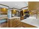 Bright kitchen featuring wooden cabinets and stainless steel appliances at 15120 Romalong Ln, Carmel, IN 46032