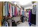 Walk-in closet with clothing racks and shelving for optimal storage at 15120 Romalong Ln, Carmel, IN 46032