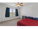Bedroom with carpet, a ceiling fan, and a window that lets in natural light at 15736 Conductors Dr, Westfield, IN 46074