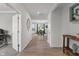 Open hallway with wood flooring leading to the dining room and other areas of the house at 15736 Conductors Dr, Westfield, IN 46074