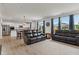 Bright open-concept living area with updated kitchen and multiple seating options, great for entertaining at 15736 Conductors Dr, Westfield, IN 46074