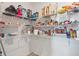 Well-stocked walk-in pantry with shelving, providing ample storage for food and kitchen essentials at 15736 Conductors Dr, Westfield, IN 46074