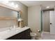 Stylish bathroom featuring modern vanity, granite countertops, and glass-enclosed shower for a luxurious experience at 16307 Stony Ridge Dr, Noblesville, IN 46060