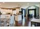 Eat-in kitchen featuring modern appliances, hardwood floors, and large windows at 16307 Stony Ridge Dr, Noblesville, IN 46060