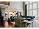 Spacious living room featuring an open floor plan, hardwood floors, and abundant natural light at 16307 Stony Ridge Dr, Noblesville, IN 46060