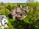 Spacious backyard with a wooden deck, ideal for outdoor entertaining at 16307 Stony Ridge Dr, Noblesville, IN 46060