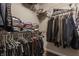 Organized walk-in closet with ample shelving and hanging space for efficient and accessible storage at 16310 Nightshore Ln, Fishers, IN 46037