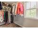 Walk-in closet with natural light, and ample shelving providing functional and organized storage space at 16310 Nightshore Ln, Fishers, IN 46037