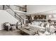 Spacious living room with an open concept, natural light, and staircase at 16310 Nightshore Ln, Fishers, IN 46037