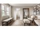 Comfortable sitting room with neutral tones, natural light, and stylish decor that creates a relaxing atmosphere at 16310 Nightshore Ln, Fishers, IN 46037