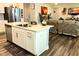 Modern kitchen island with white countertops and stainless steel appliances at 17324 Americana Crossing Xing, Noblesville, IN 46060
