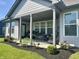 Inviting covered patio perfect for outdoor entertaining and relaxation at 17324 Americana Crossing Xing, Noblesville, IN 46060